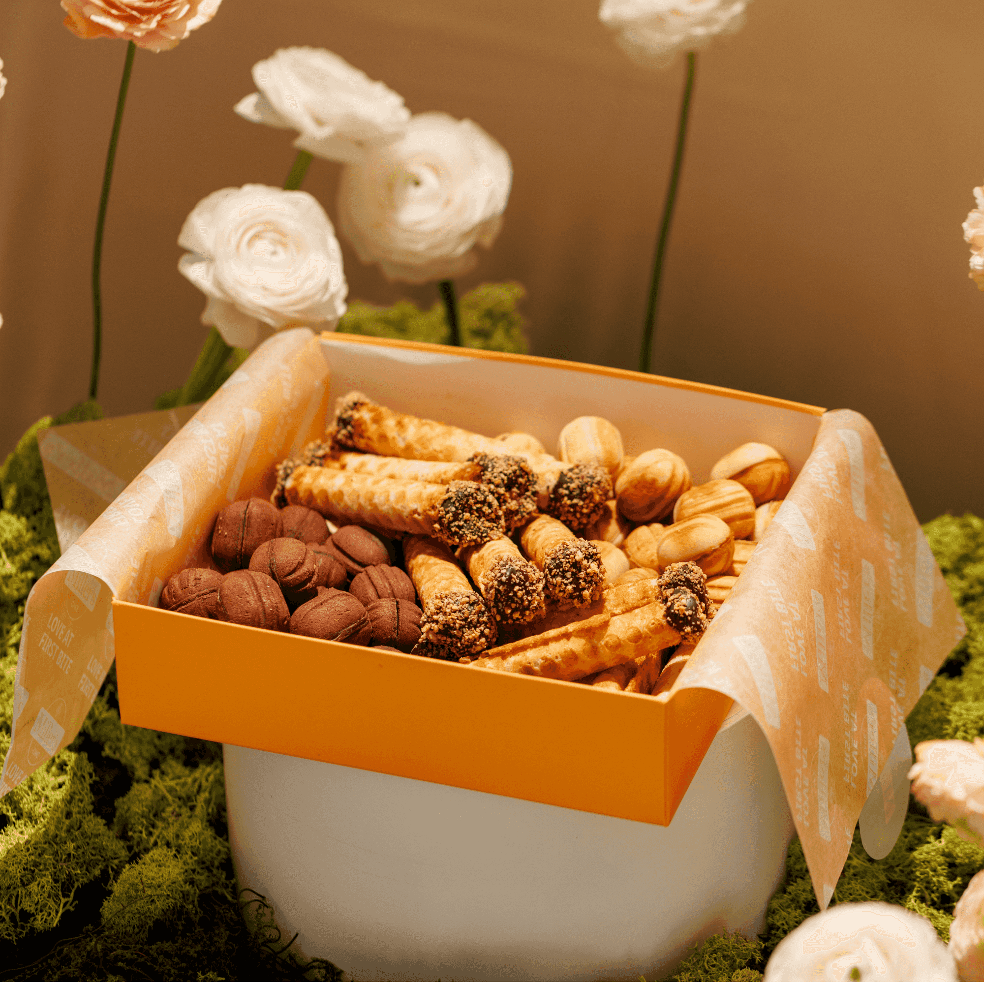 Assorted set of walnut cookies and cream rolls 1