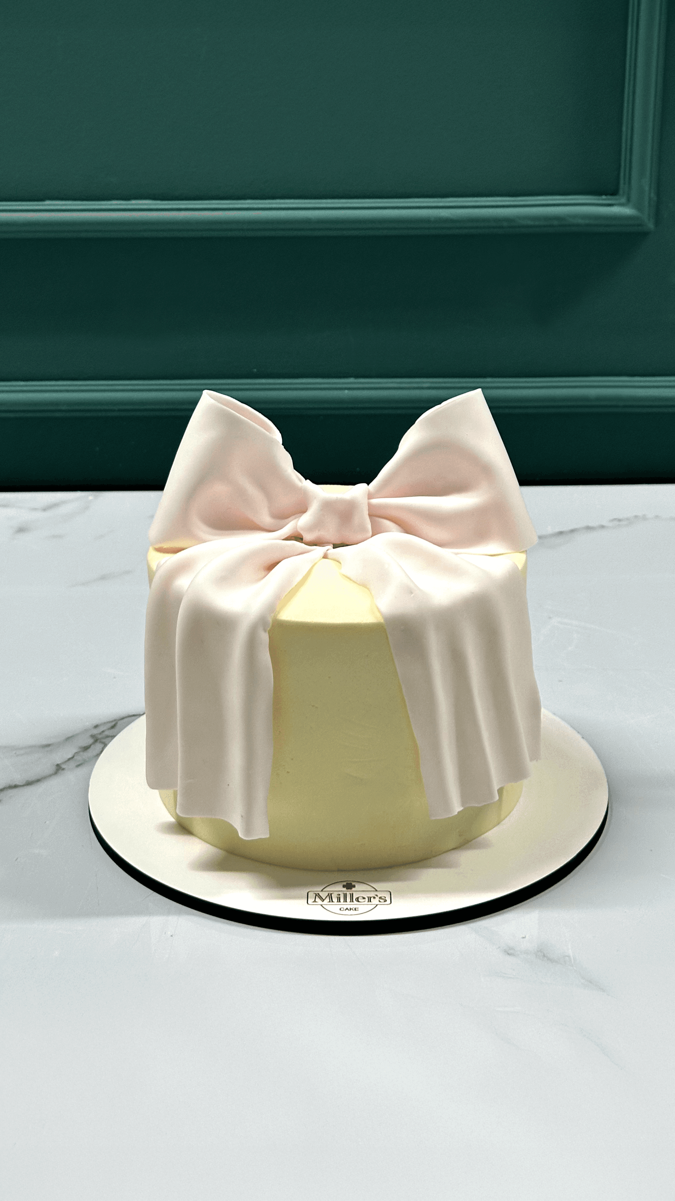 Chic Bow Cake — Soft & Elegant